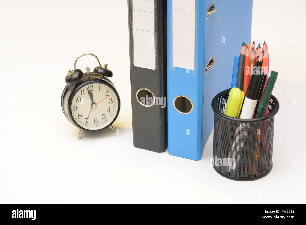 Office Table Clock Pen Holder and Document folder Stock Photo Alamy