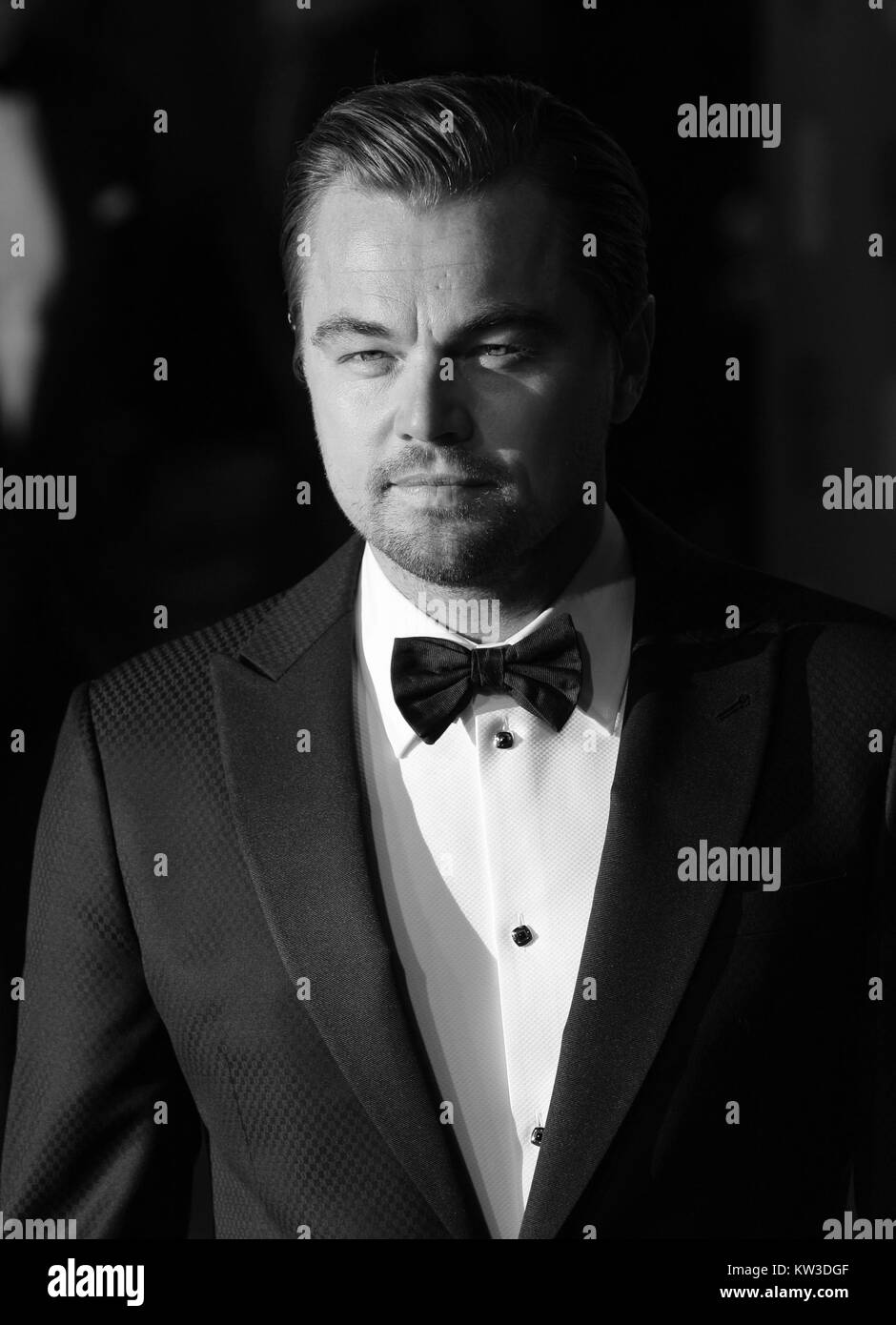 LONDON - FEB 14, 2016: ( Image digitally altered to monochrome ) Leonardo DiCaprio attends the EE Bafta British Academy Film Awards at the Royal Opera House on Feb 14, 2016 in London Stock Photo