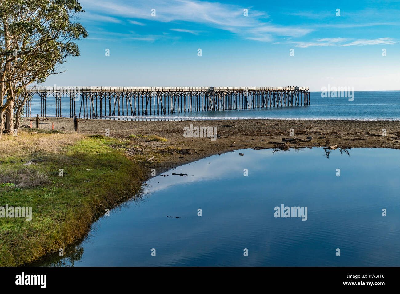 The pier at the William Randolph Hearst Memorial State Beach located near the historic town of San Simeon along California State Route 1, in San Luis  Stock Photo