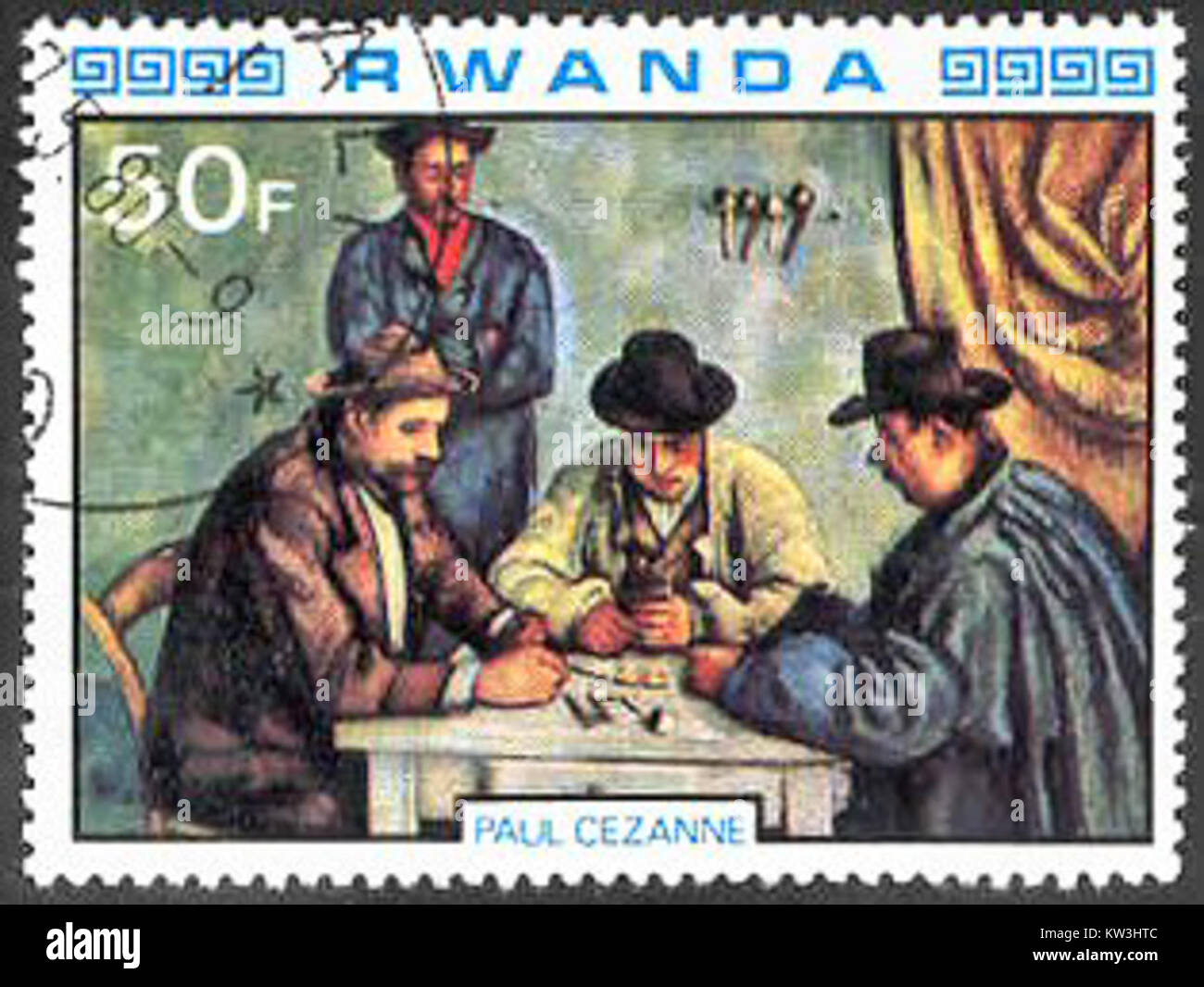 The Card Players 1890 92 by Cezanne on a 1980 stamp of Rwanda Stock Photo