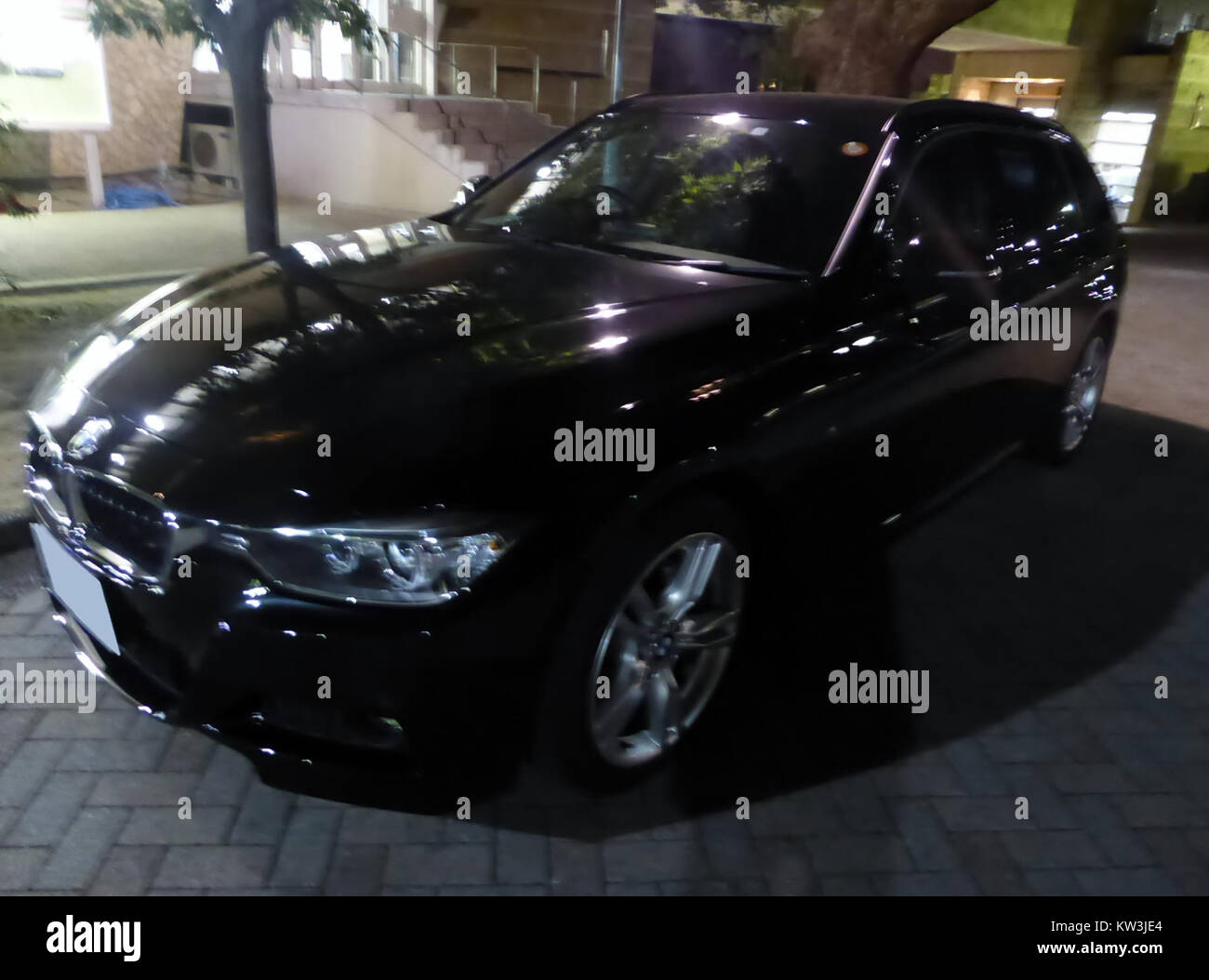 BMW 320d Touring (F31) at night front Stock Photo - Alamy