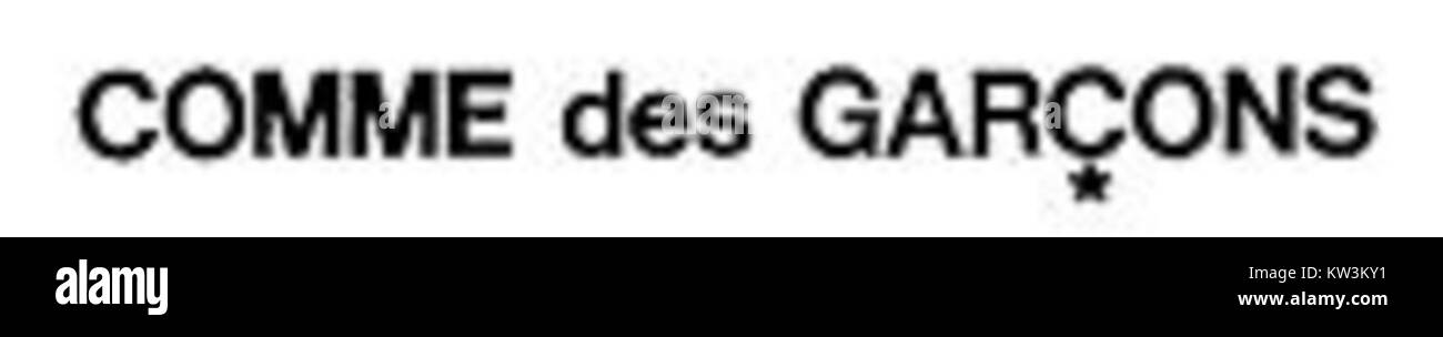 The logo of Comme des GarÃ§ons, a well-known Japanese fashion brand. The brand is famous for its avant-garde designs and its influence on global fashion trends, pushing boundaries with unconventional styles and clothing collections. Stock Photo