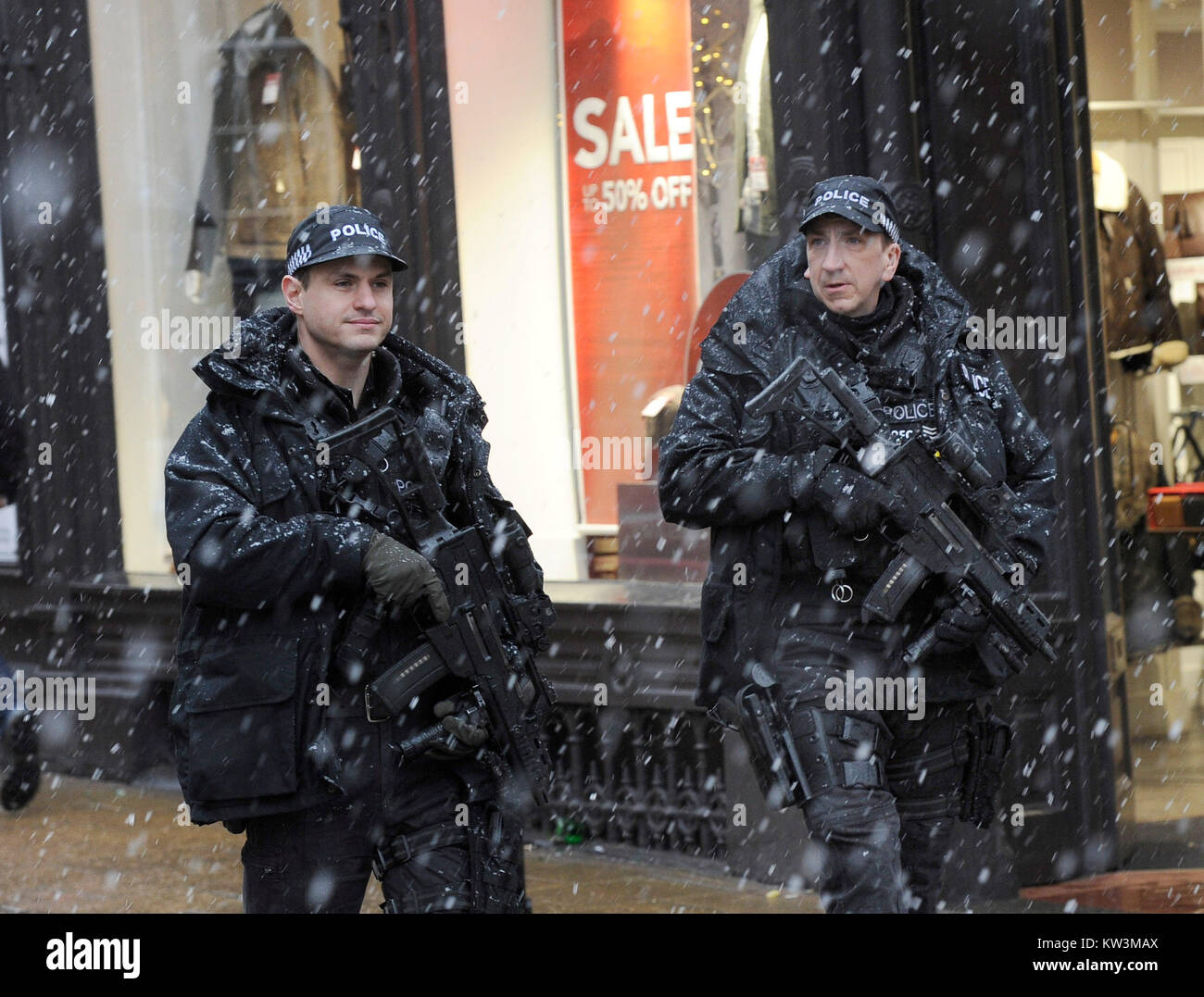 Armed Police from the North Yorks Police Fire Arms Section patrol York in the snow after Britain saw one of the coldest nights of the year with temperatures falling to minus 12.3C at Loch Glascarnoch in the Scottish Highlands overnight and heavy snow expected over part of the north of England. Stock Photo