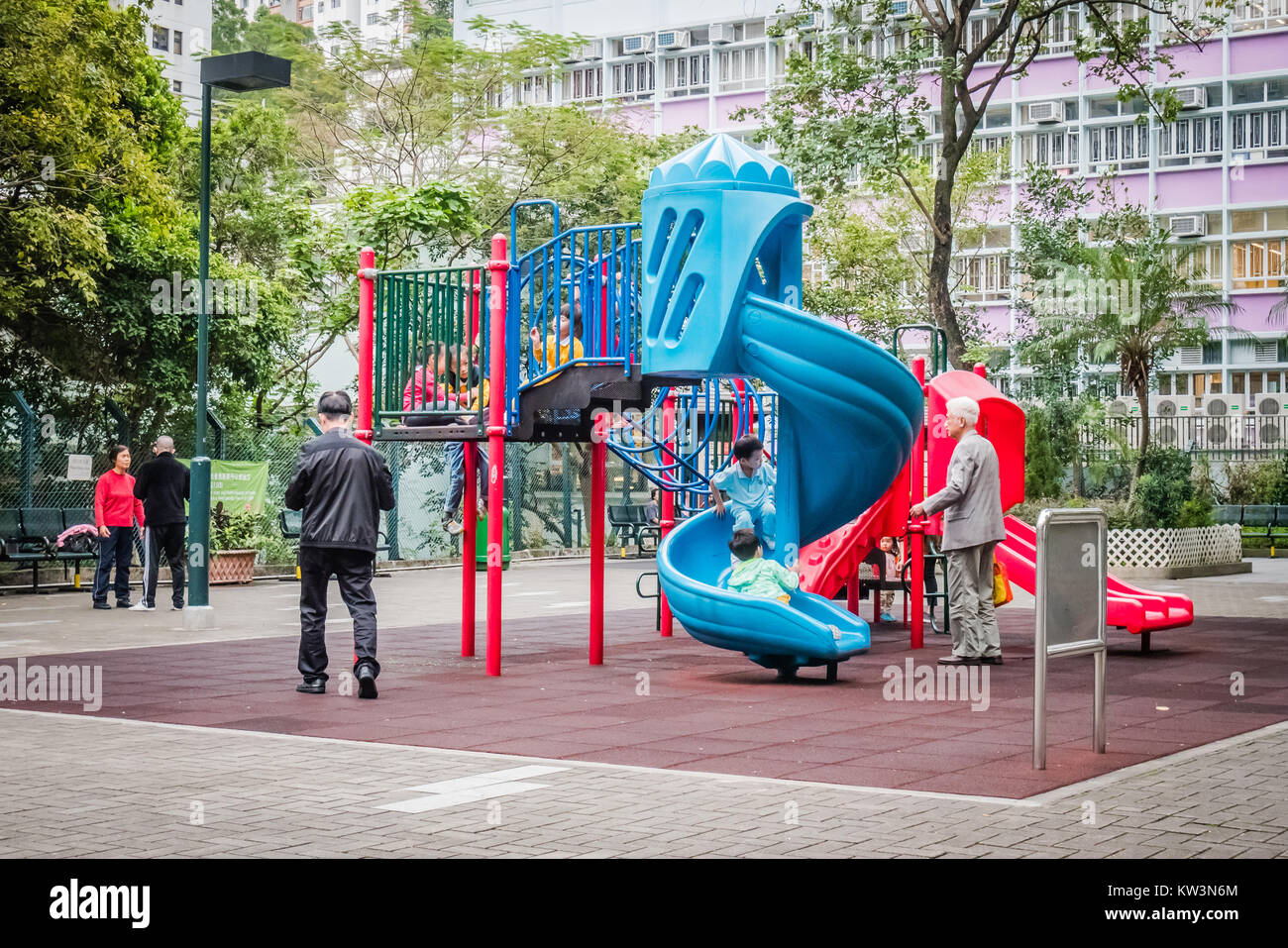 children playing in public playground in hong kong Stock Photo - Alamy