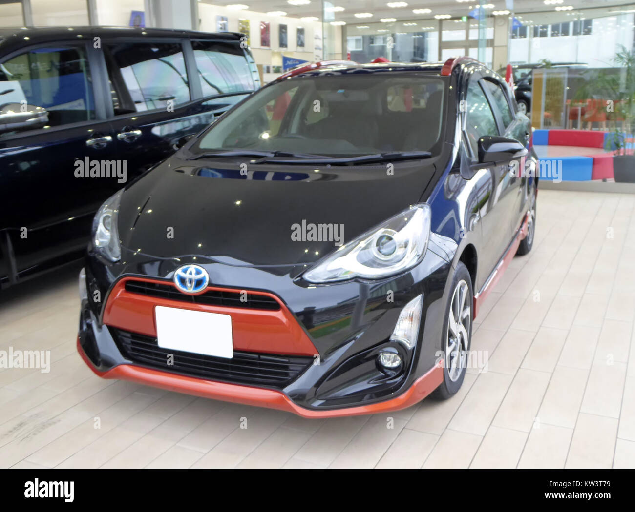 A front view of a black Toyota AQUA X URBAN (NHP10), showcasing its ...