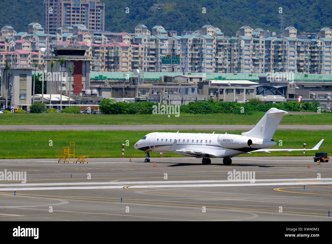 Bombardier BD 700 Global Express N899CH at Taipei Songshan Airport 20150908a Stock Photo