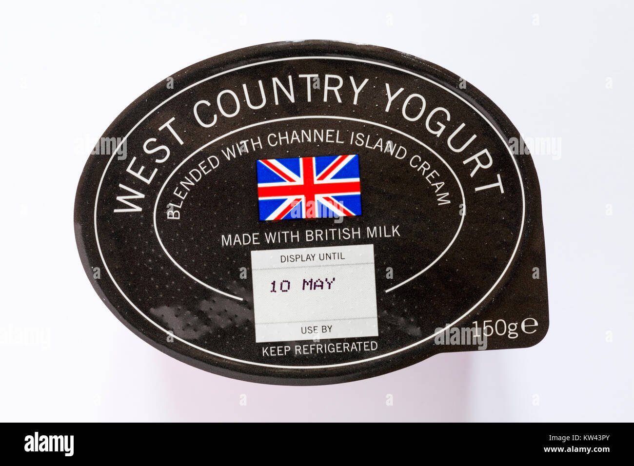 West Country Yogurt blended with Channel Island cream made with British Milk - looking down on lid of Tesco Finest Strawberries & Cream yogurt Stock Photo