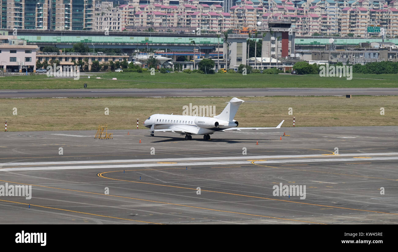 Bombardier BD 700 Global Express N899CH Parked at Taipei Songshan Airport 20160924a Stock Photo