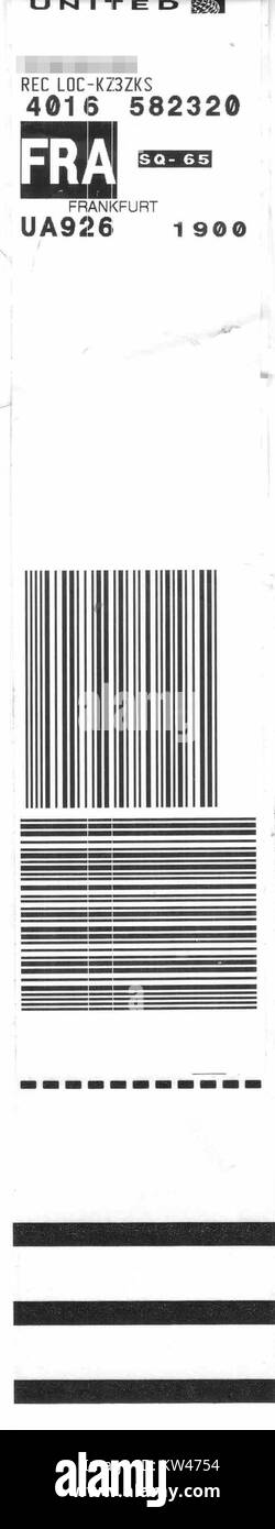 The United Airlines bag tag UA926 corresponds to baggage for a flight from San Francisco to Frankfurt on September 15, 2014, reflecting the airline's international travel operations. Stock Photo