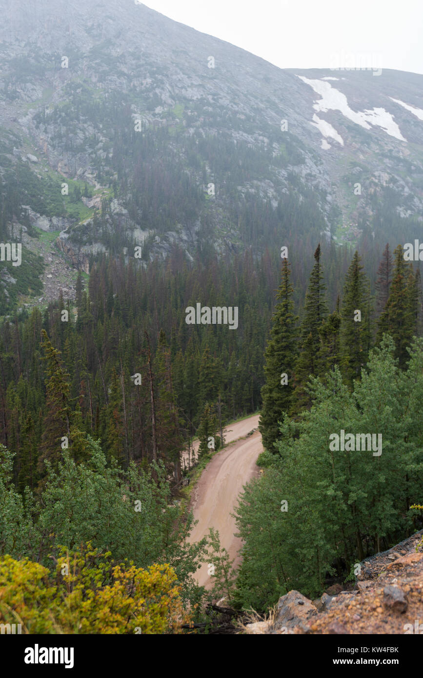 Driving down muddy forest road hi-res stock photography and images - Alamy