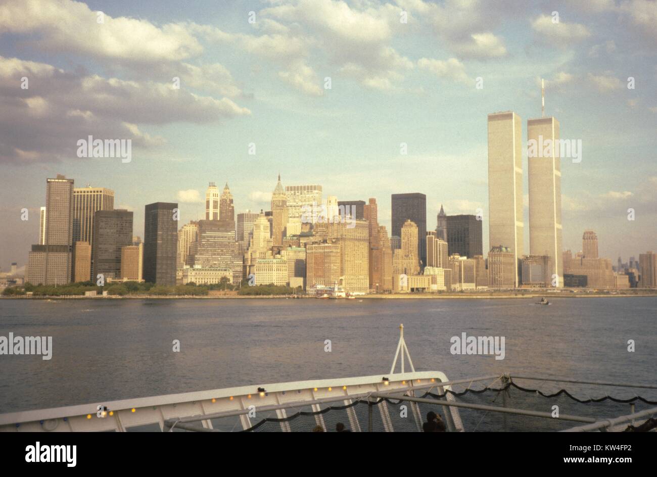 Twin towers of the World Trade Center, viewed from the aft deck of the Cunard Line's Queen Elizabeth 2 cruise ship in New York Harbor, New York City, New York, 1975. Stock Photo
