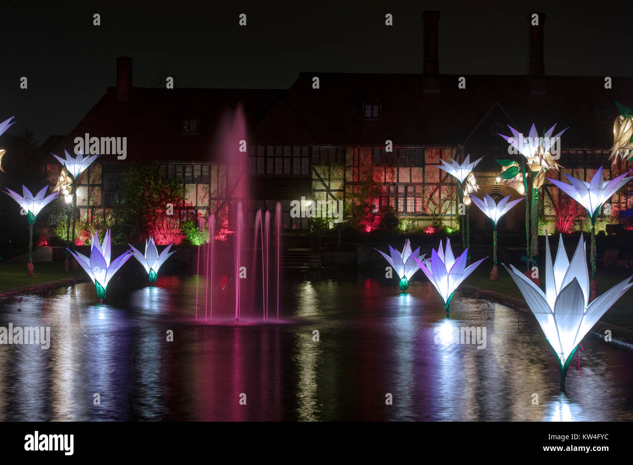 Christmas lights and lit up flower decorations outside the Laboratory building. RHS Wisley gardens, Surrey, England. Christmas Glow Festival 2017 Stock Photo