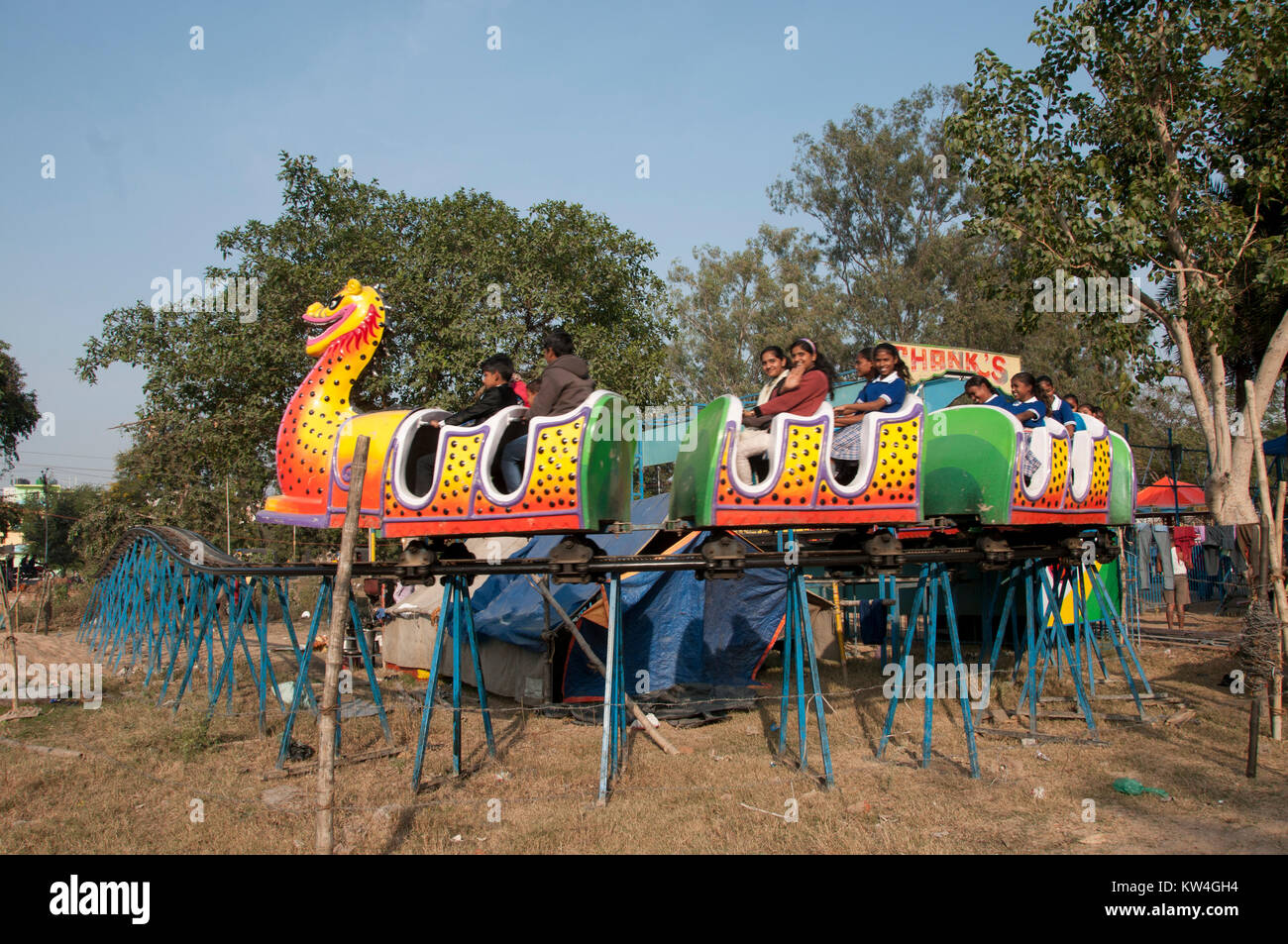 India. Bihar. Bodhgaya. Funfair. Dragon ride Stock Photo Alamy