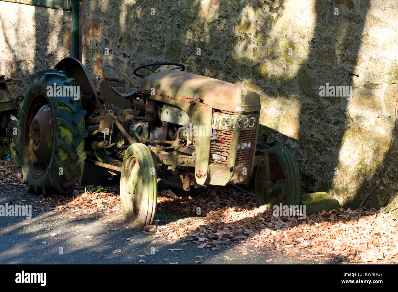 Antiquated tractor in disrepair Stock Photo