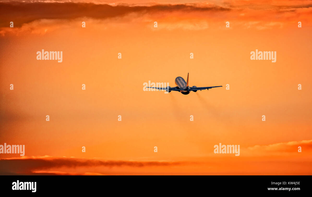 airplane-in-the-air-and-sunset-in-background-stock-photo-alamy