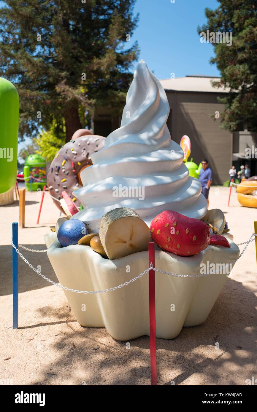 At the Googleplex, headquarters of the search engine company Google in the Silicon Valley town of Mountain View, California, a large statue of frozen yogurt represents Version 2.2 of the Android cellphone operating system, which was code-named 'FroYo', Mountain View, California, August 24, 2016. Stock Photo