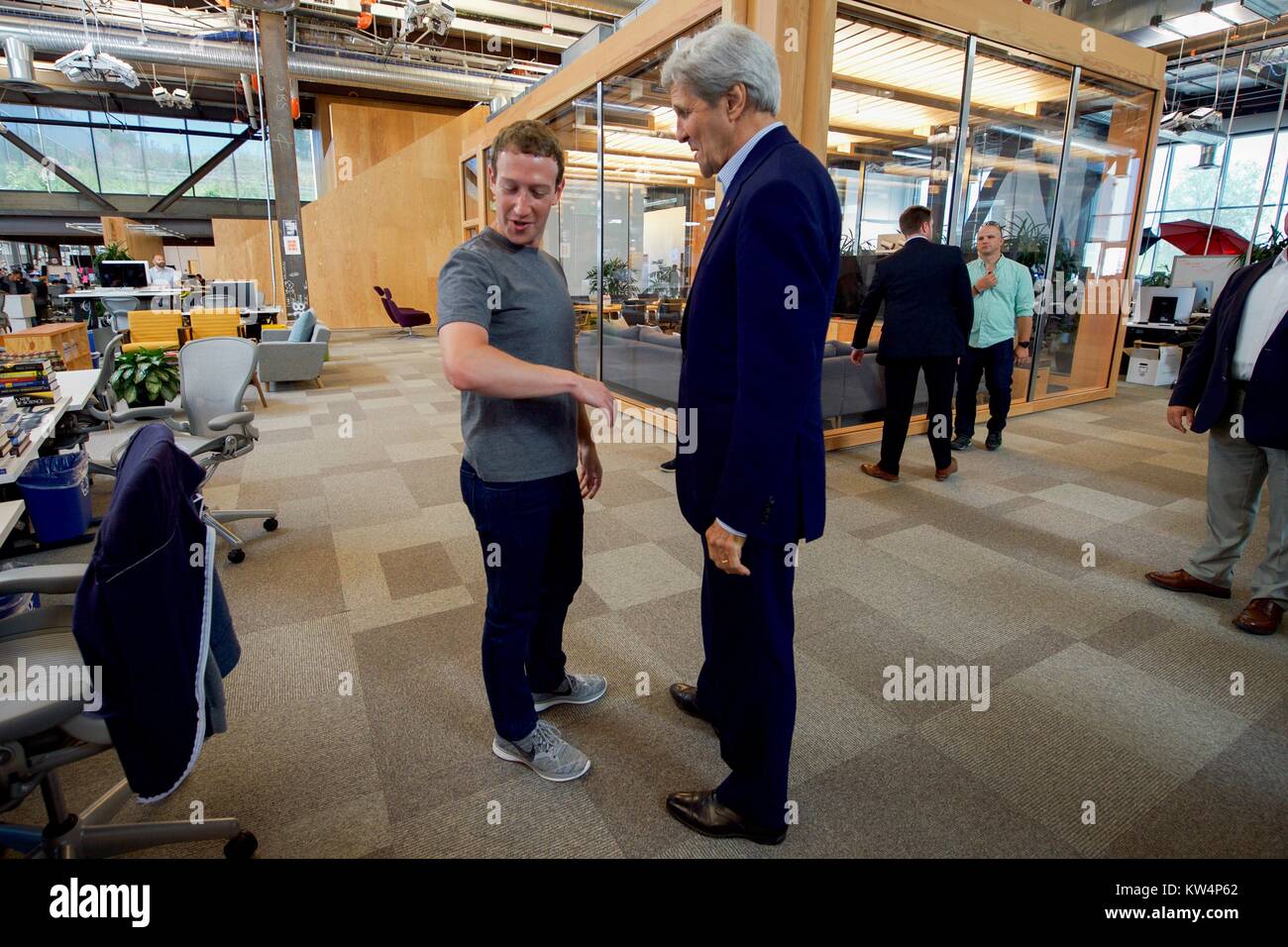US Secretary of State John Kerry speaking with Facebook CEO Mark Zuckerberg at Facebook headquarters, Menlo Park, California, 2016. Image courtesy US Department of State. Stock Photo