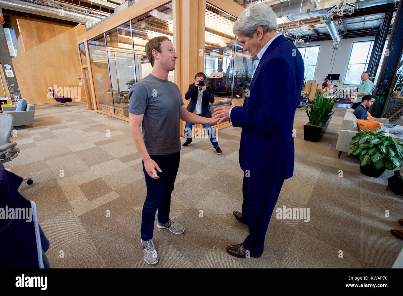 US Secretary of State John Kerry speaking with Facebook CEO Mark Zuckerberg, Menlo Park, California, June 23, 2016. Image courtesy US Department of State. Stock Photo