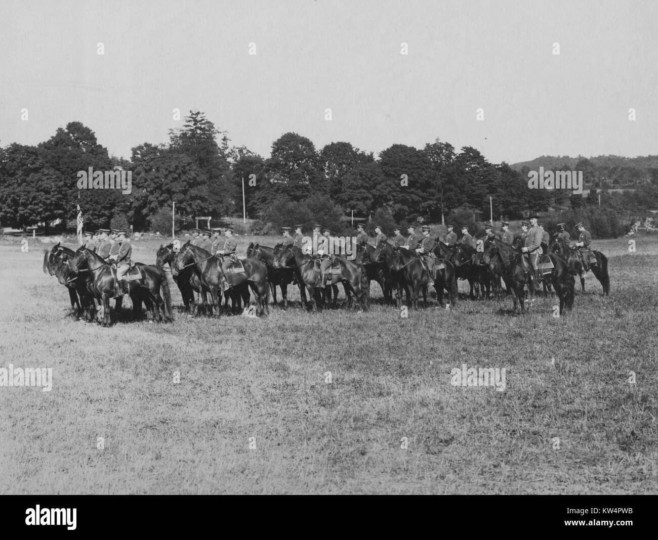 Troop of mounted policemen in columns of fours in a field in Kensico, New York, September 15, 1914. From the New York Public Library. Stock Photo
