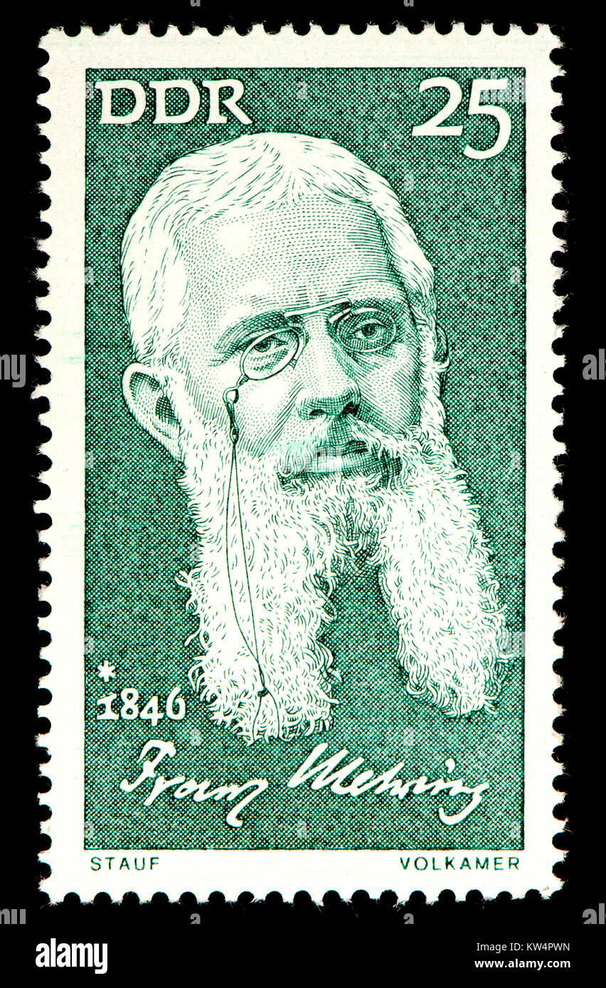 East German (DDR) postage stamp (1971): Franz Erdmann Mehring (1846 – 1919) German publicist, politician and historian. Stock Photo