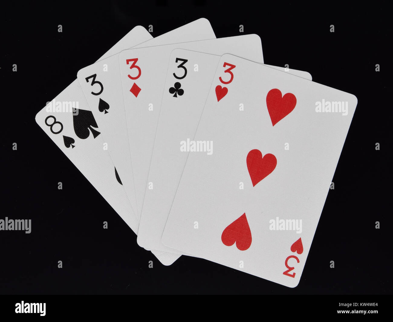 Four of a Kind hand in poker card game Stock Photo Alamy