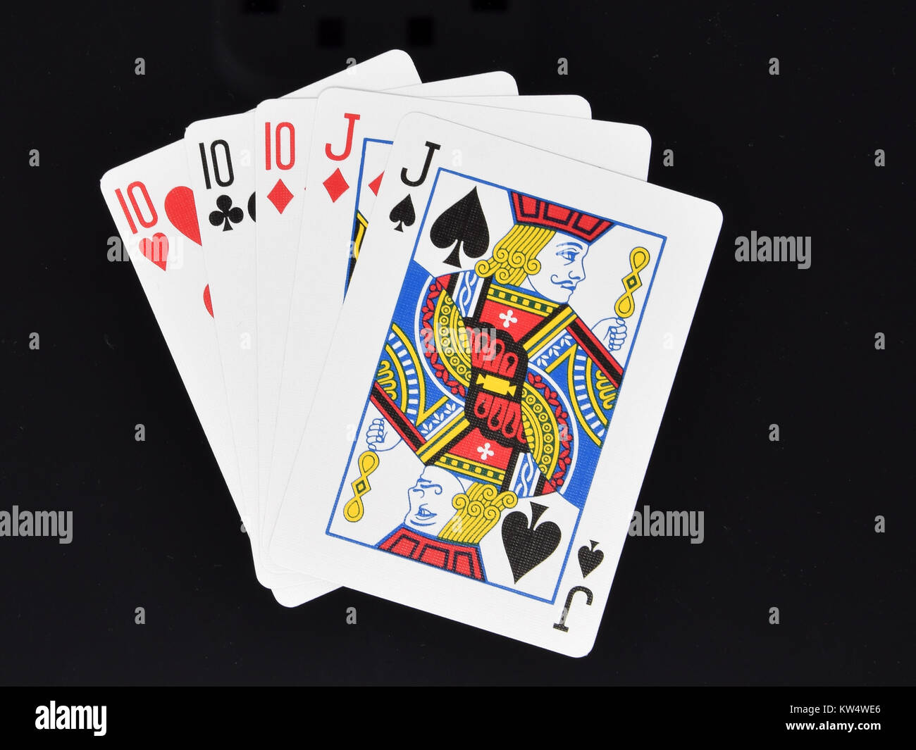 Full House hand in poker card game Stock Photo Alamy