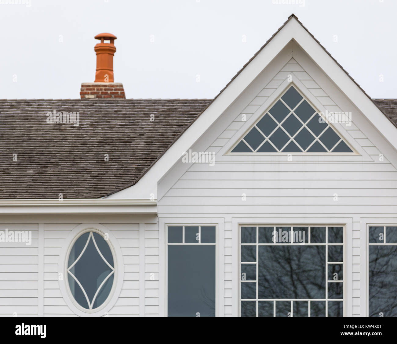 detail image of a house with different types of windows Stock Photo