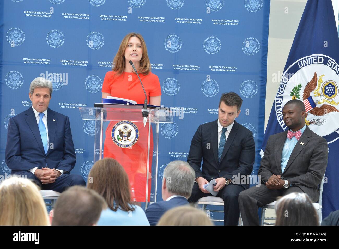 Assistant Secretary of State for the Bureau of Educational and Cultural Affairs Evan Ryan (at podium) speaks alongside U.S. Secretary of State John Kerry (far left) at the Airbnb luncheon for the U.S. Department of State's Gilman Scholarship Program, September 12, 2016. Image courtesy US Department of State. Stock Photo