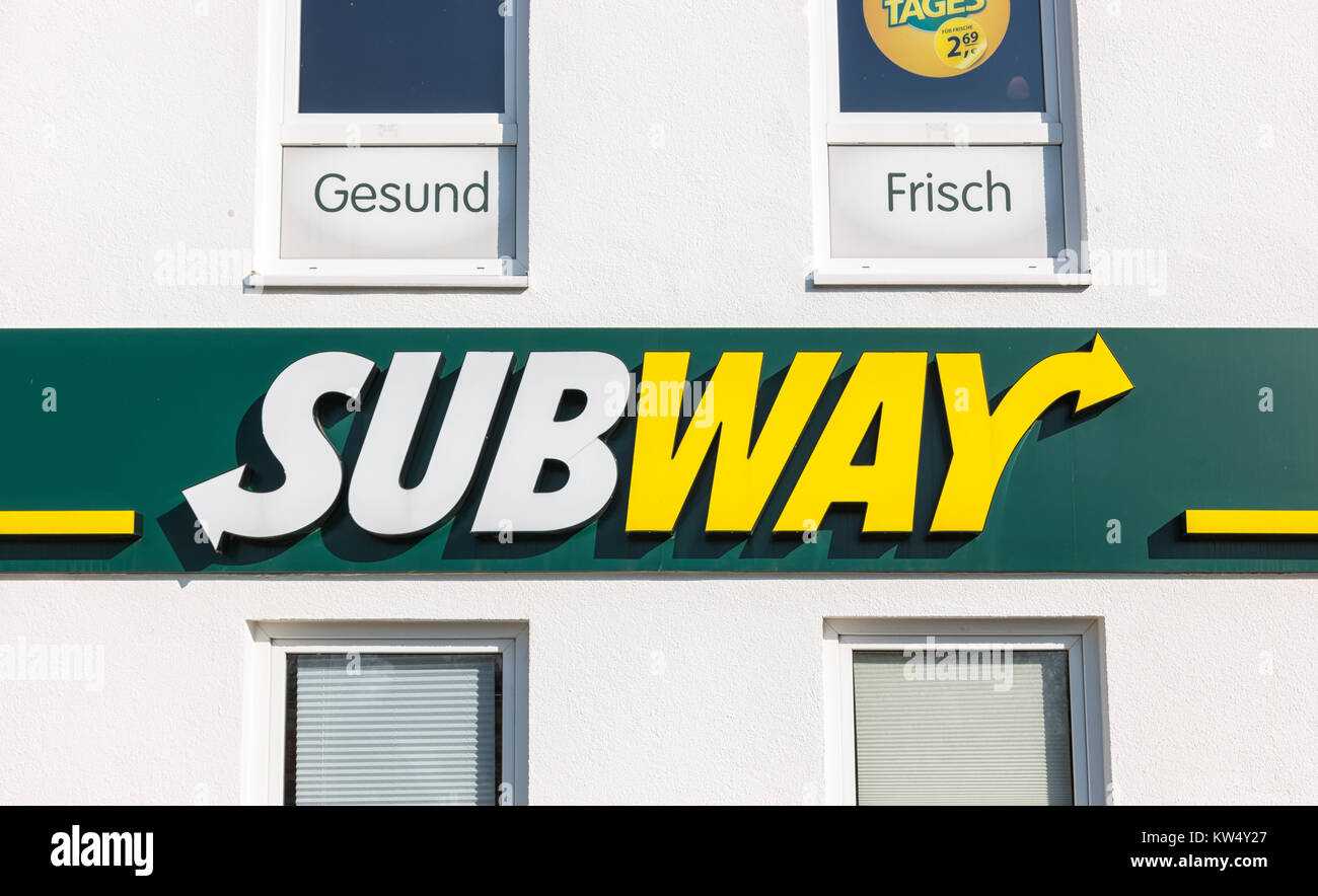 Subway fast food restaurant sign. Subway is an American fast food franchise offering sub sandwiches and salads. Subway has over 43,000 restaurants Stock Photo