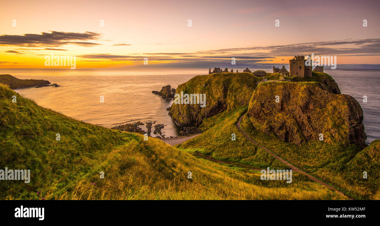 This is a summer sunrise image of Dunnottar Castle, Aberdeenshire, Scotland. UK. Stock Photo