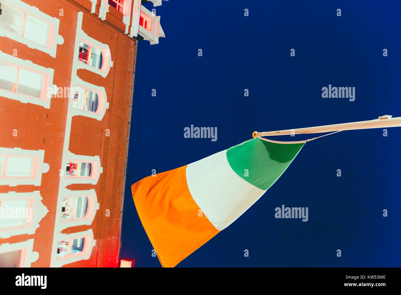 DUBLIN, IRELAND December 24th, 2017 Irish flag waving in front of