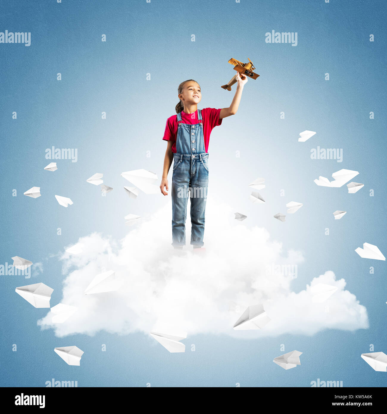 Cute kid girl on cloud and paper planes flying around Stock Photo - Alamy