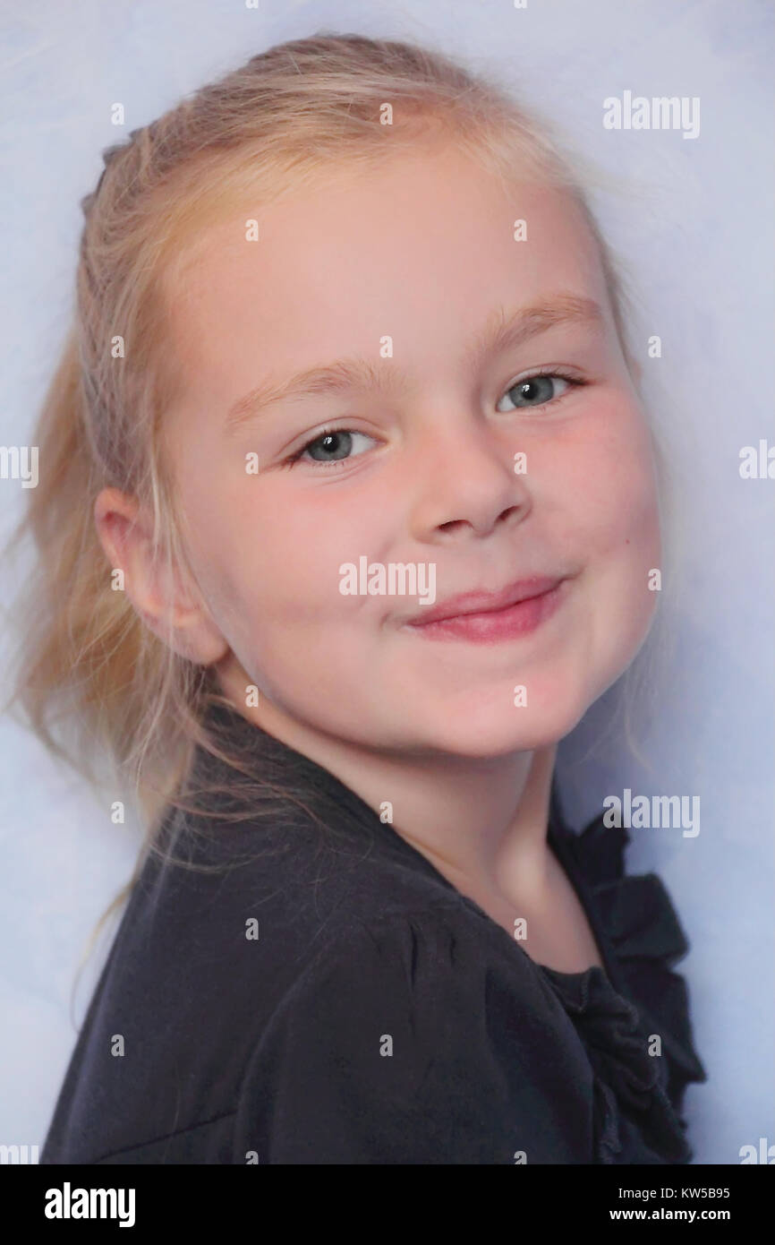 Portrait of beautiful girl with blond hair and blue eyes Stock Photo ...
