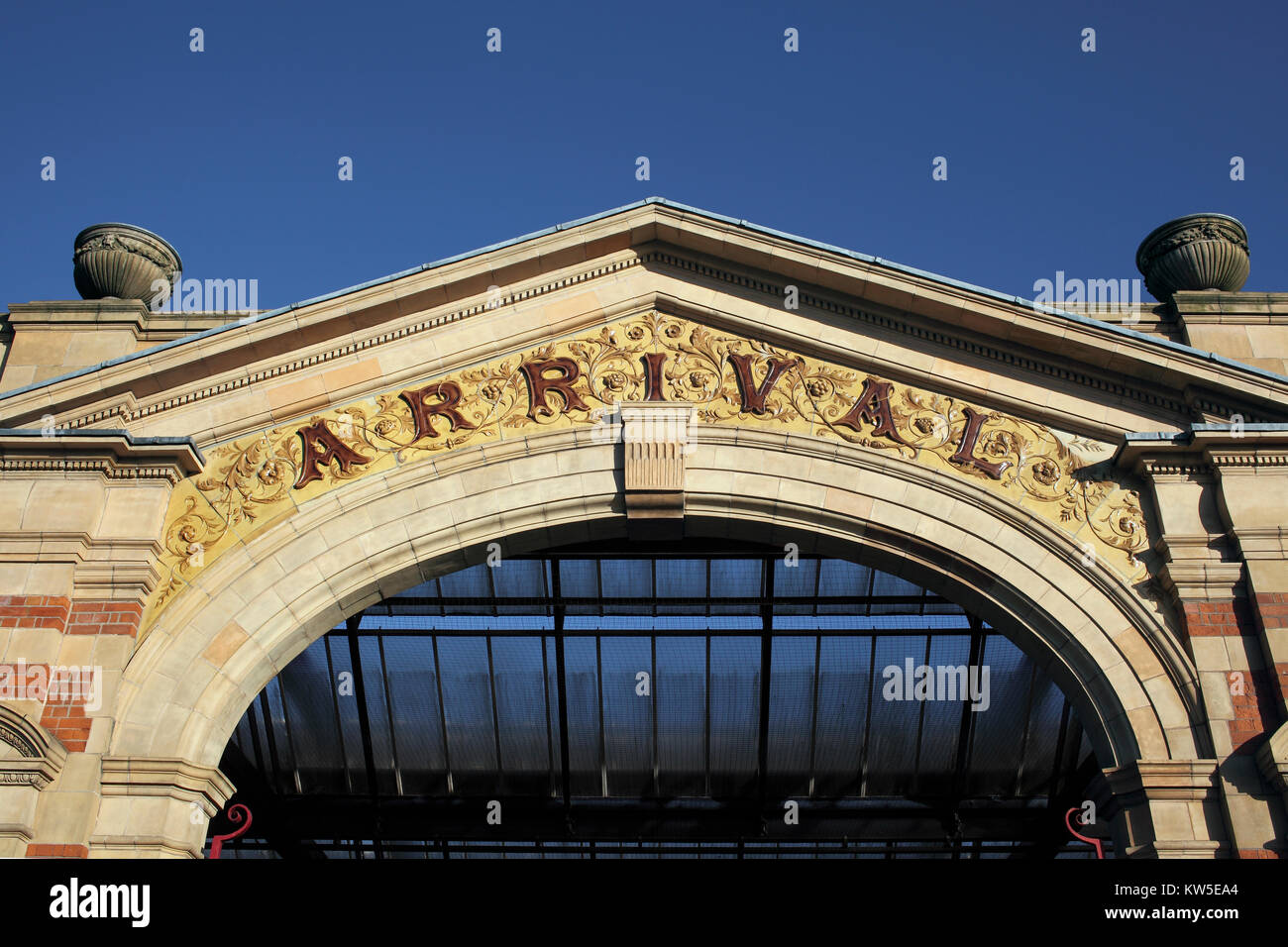An elaborate archway at the entrance to the late-Victorian London Road railway station, Leicester. Stock Photo
