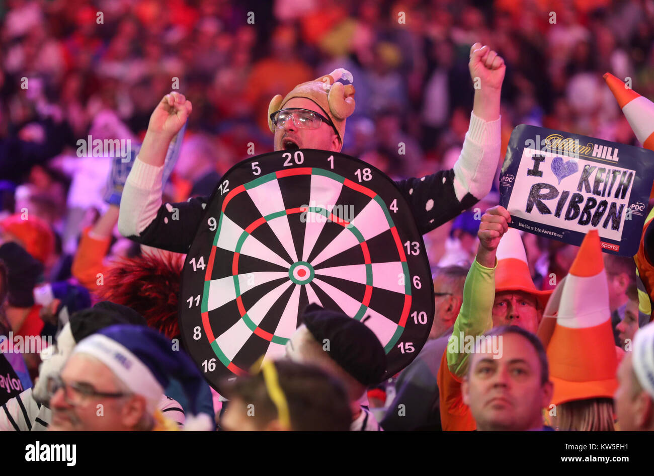 Darts fans in the stands during day thirteen of the William Hill World Darts  Championship at Alexandra Palace, London Stock Photo - Alamy