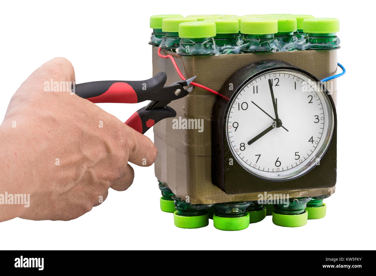 Deactivation of timed bomb. Detail of the hand during disposal of dangerous timebomb on white background. Isolated. Stock Photo