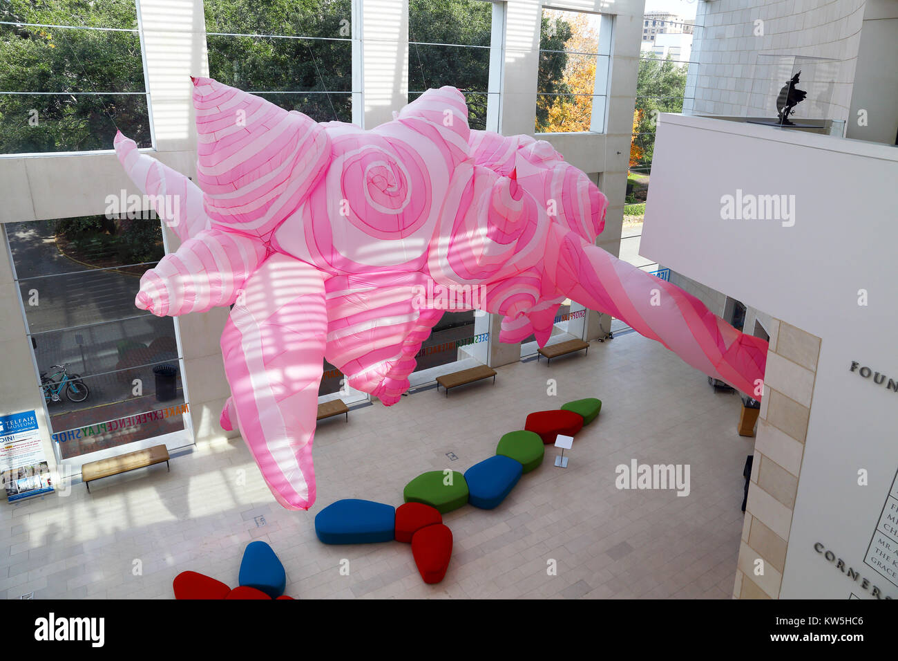 A large inflatable installation piece by artist Anne Ferrer hangs from the cieling of the Jepson Center Eckburg Atrium in Savannah Georgia. Stock Photo