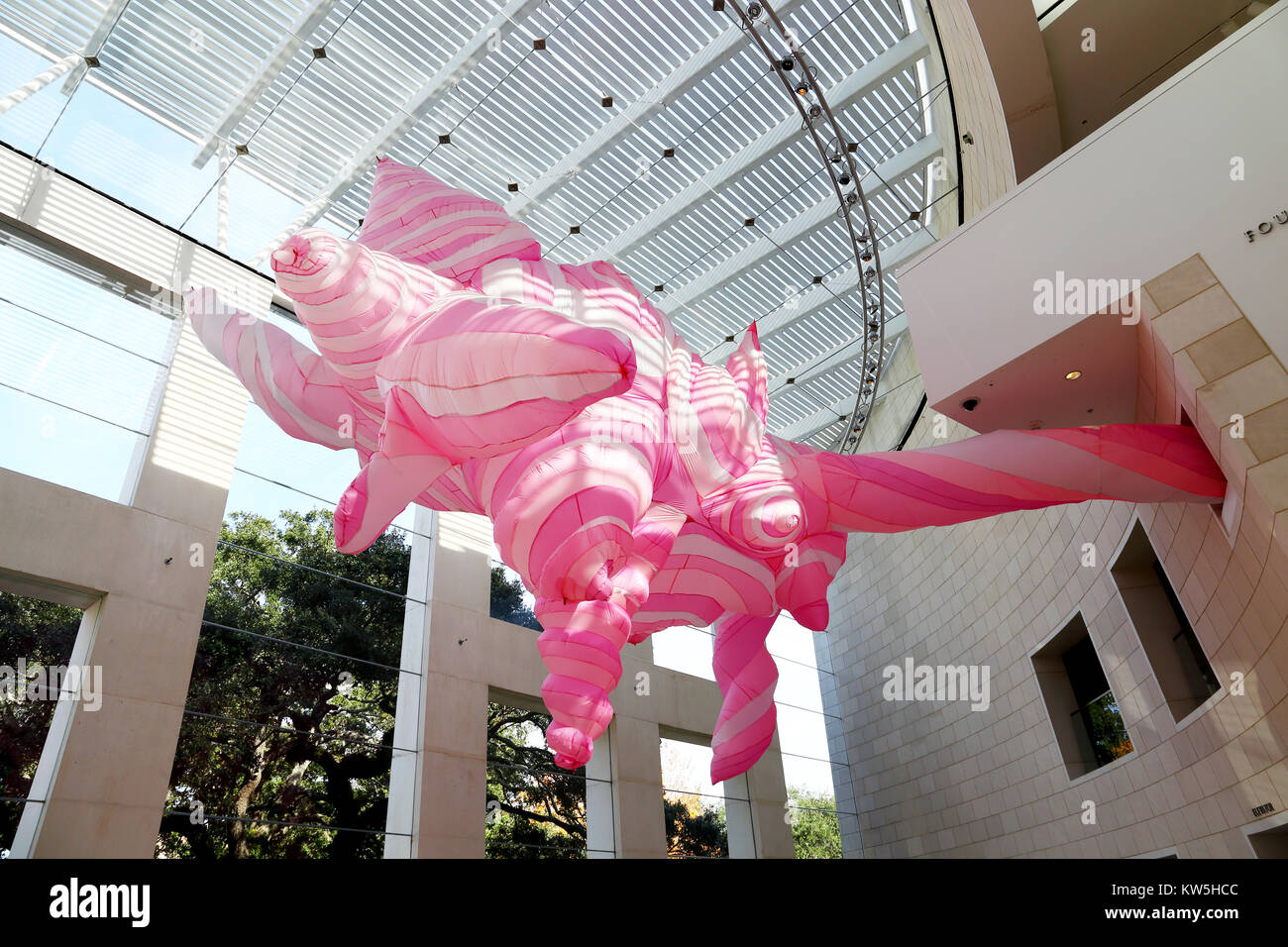 A large inflatable installation piece by artist Anne Ferrer hangs from the cieling of the Jepson Center Eckburg Atrium in Savannah Georgia. Stock Photo