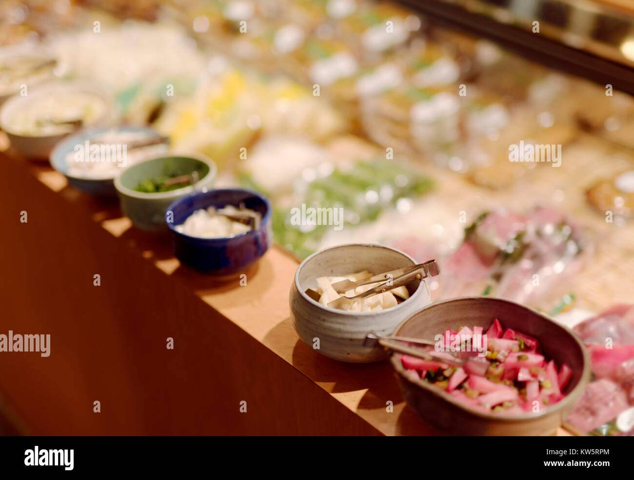 Japanese pickled radish Tsukemono food samples on store display in