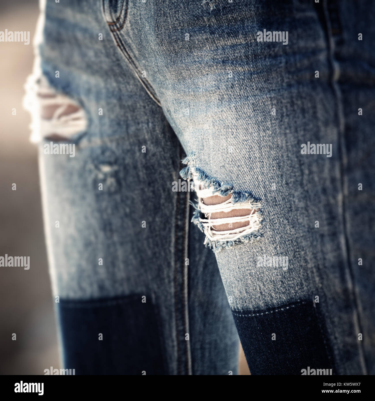 holes in jeans Stock Photo Alamy