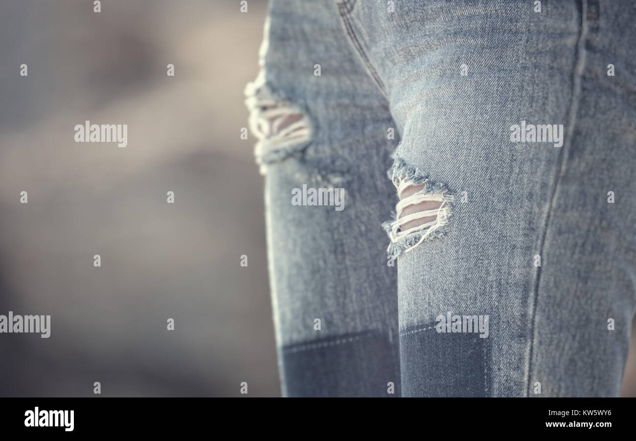 holes in jeans Stock Photo Alamy