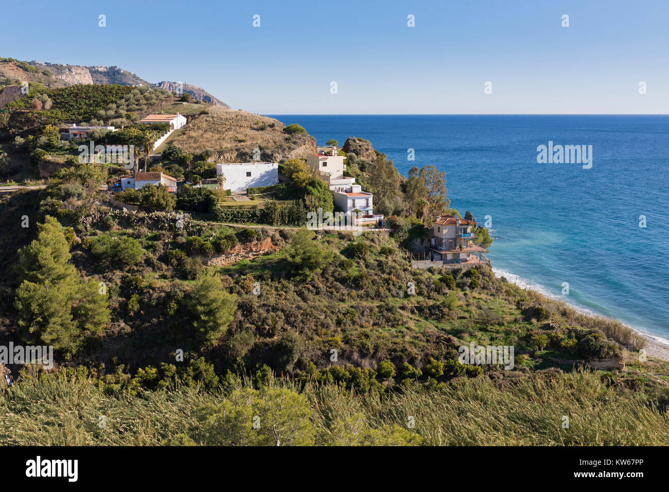 near Nerja, Costa del Sol, Malaga Province, Andalusia, southern Spain.  Property overlooking the Mediterranean within the protected area of Acantilado Stock Photo