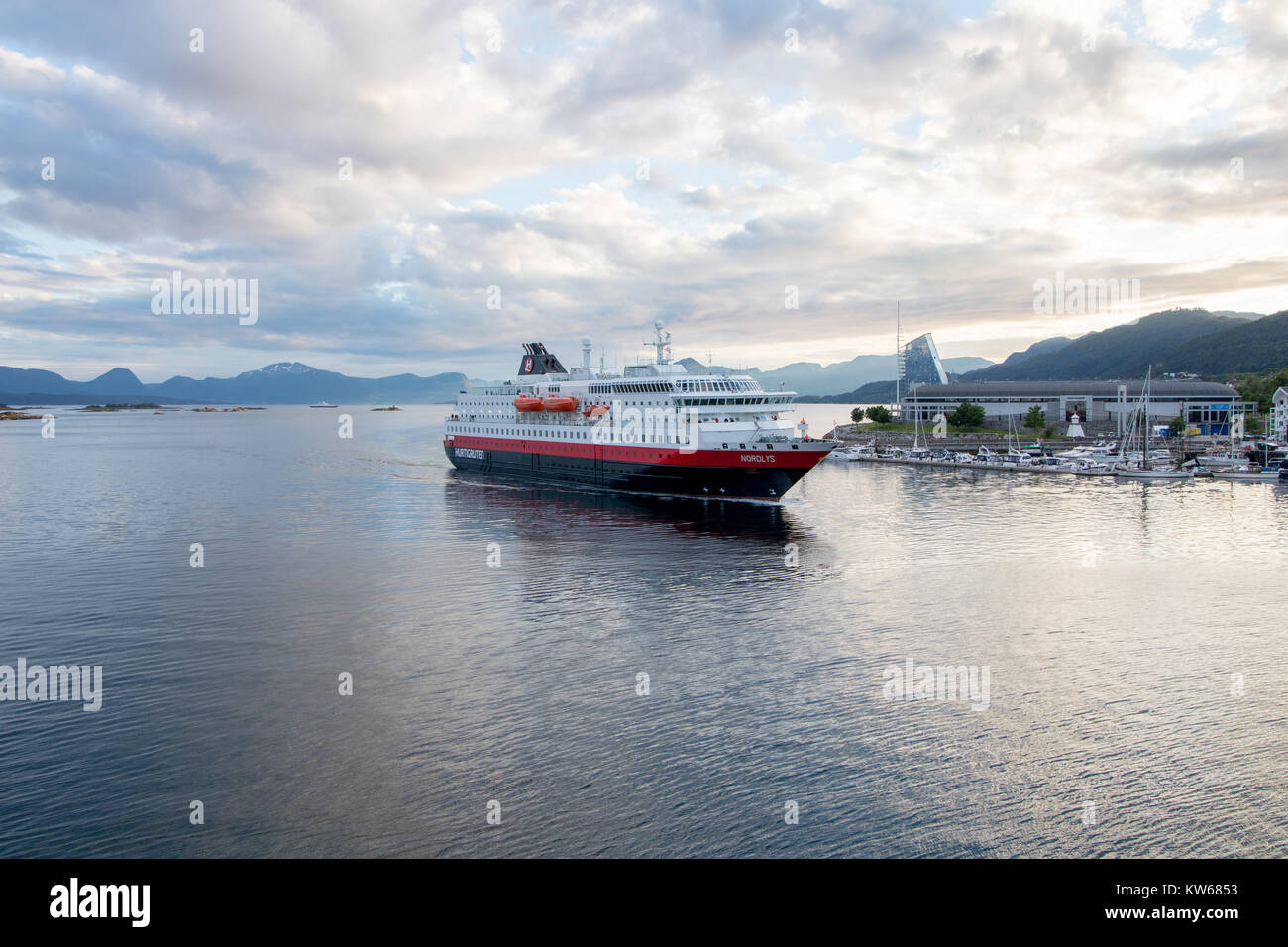 MOLDE, NORWAY - JULY 14, 2017: The Hurtigruten ship 'MS Nordlys' entering Molde harbour in Norway. Stock Photo