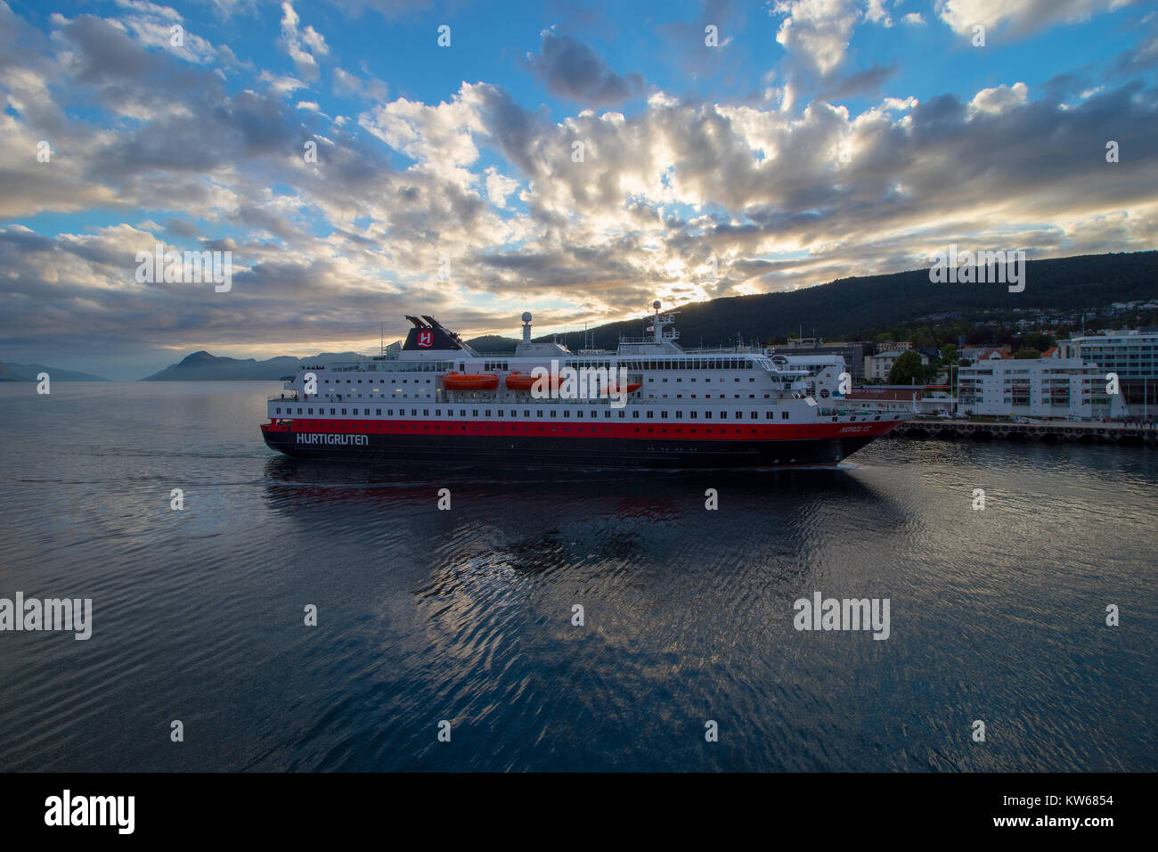 MOLDE, NORWAY - JULY 14, 2017: The Hurtigruten ship 'MS Nordlys' entering Molde harbour in Norway. Stock Photo