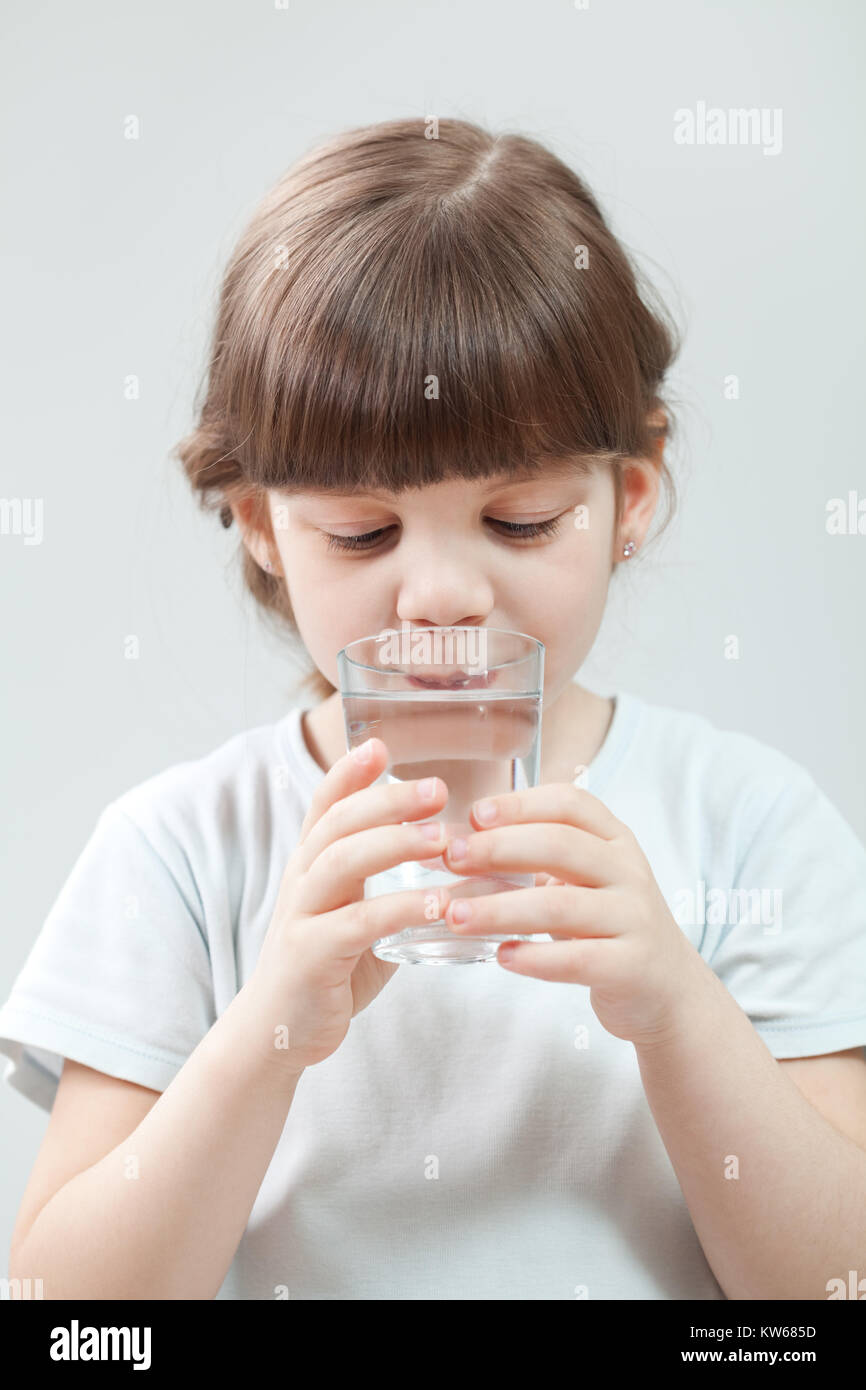 Little girl drinking water Stock Photo