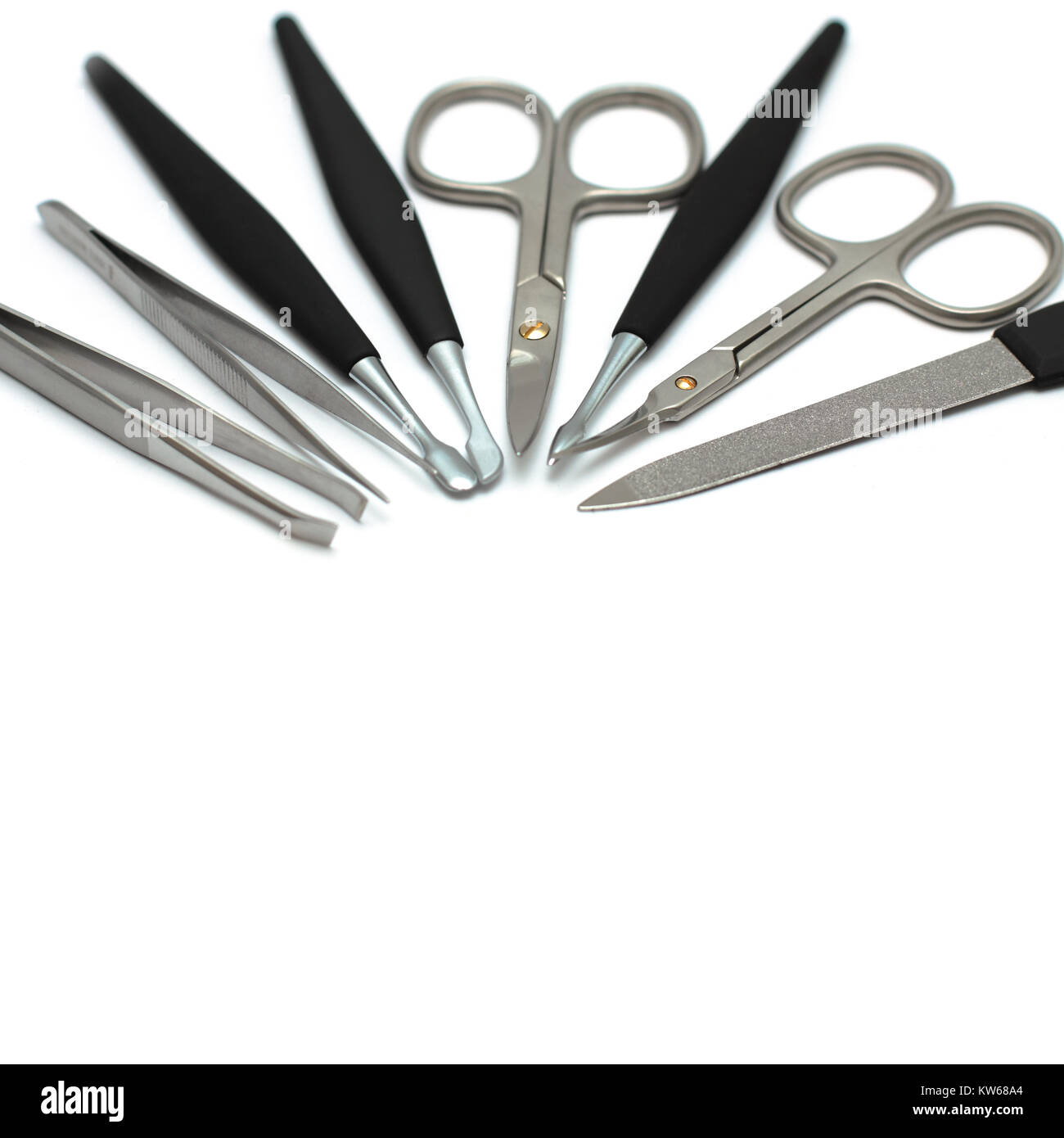 Manicure tools isolated on white beauty salon equipment Stock Photo