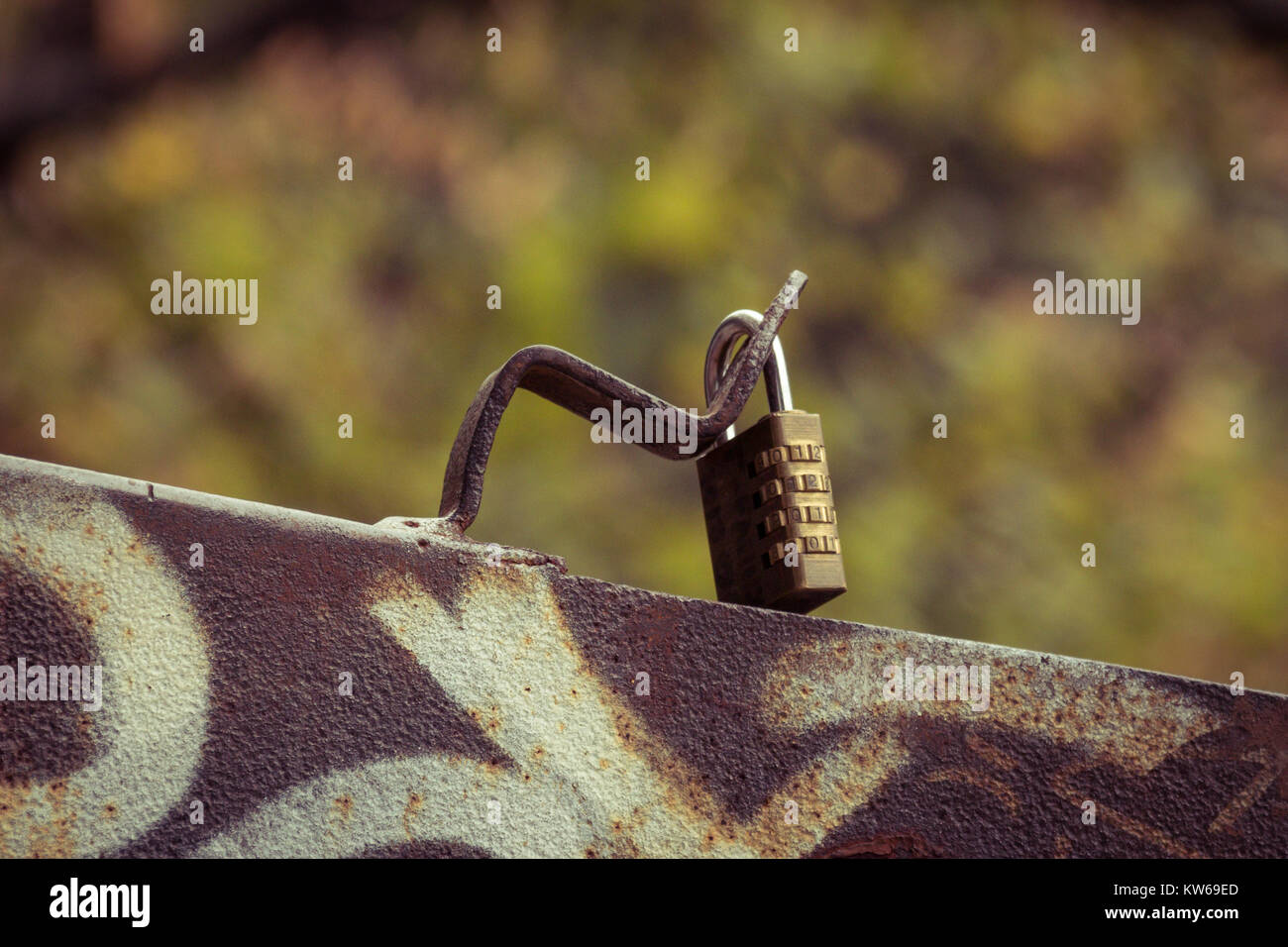 padlock on a carrier with blurry background prague Stock Photo - Alamy