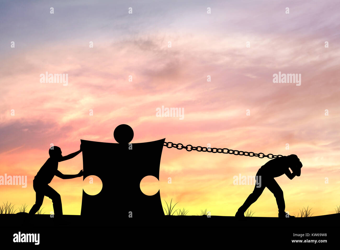 Silhouette of men helping push and pull puzzle concept as teamwork and