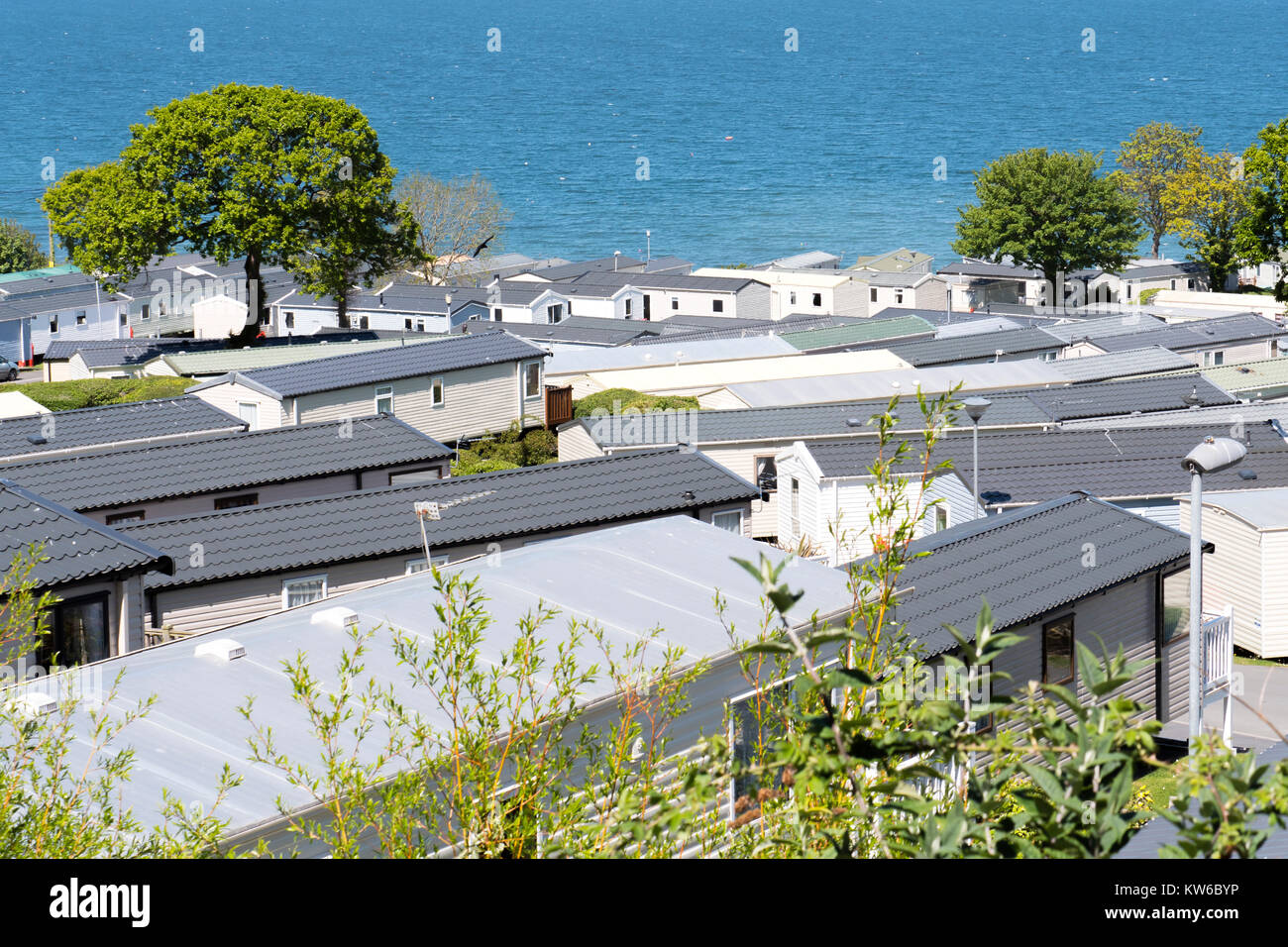 Holiday caravan park and coast line New Quay Ceredigion Wales Stock Photo