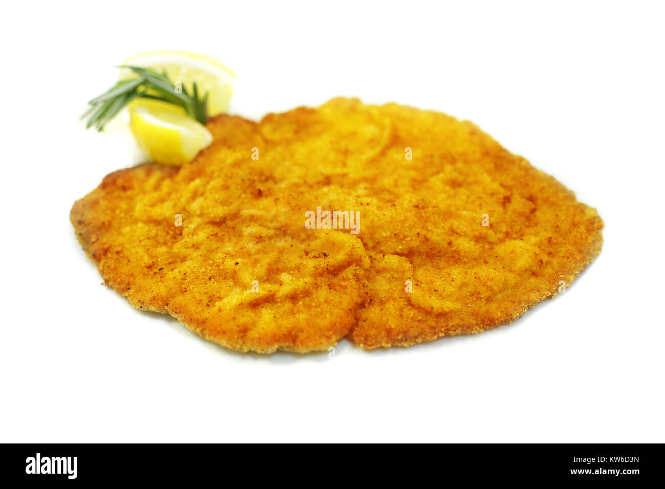 Schnitzel isolated, escalope meat with lemon and rosmary Stock Photo
